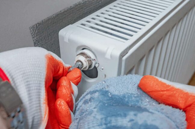 Hand with a key for draining air drains water and air from the heater.